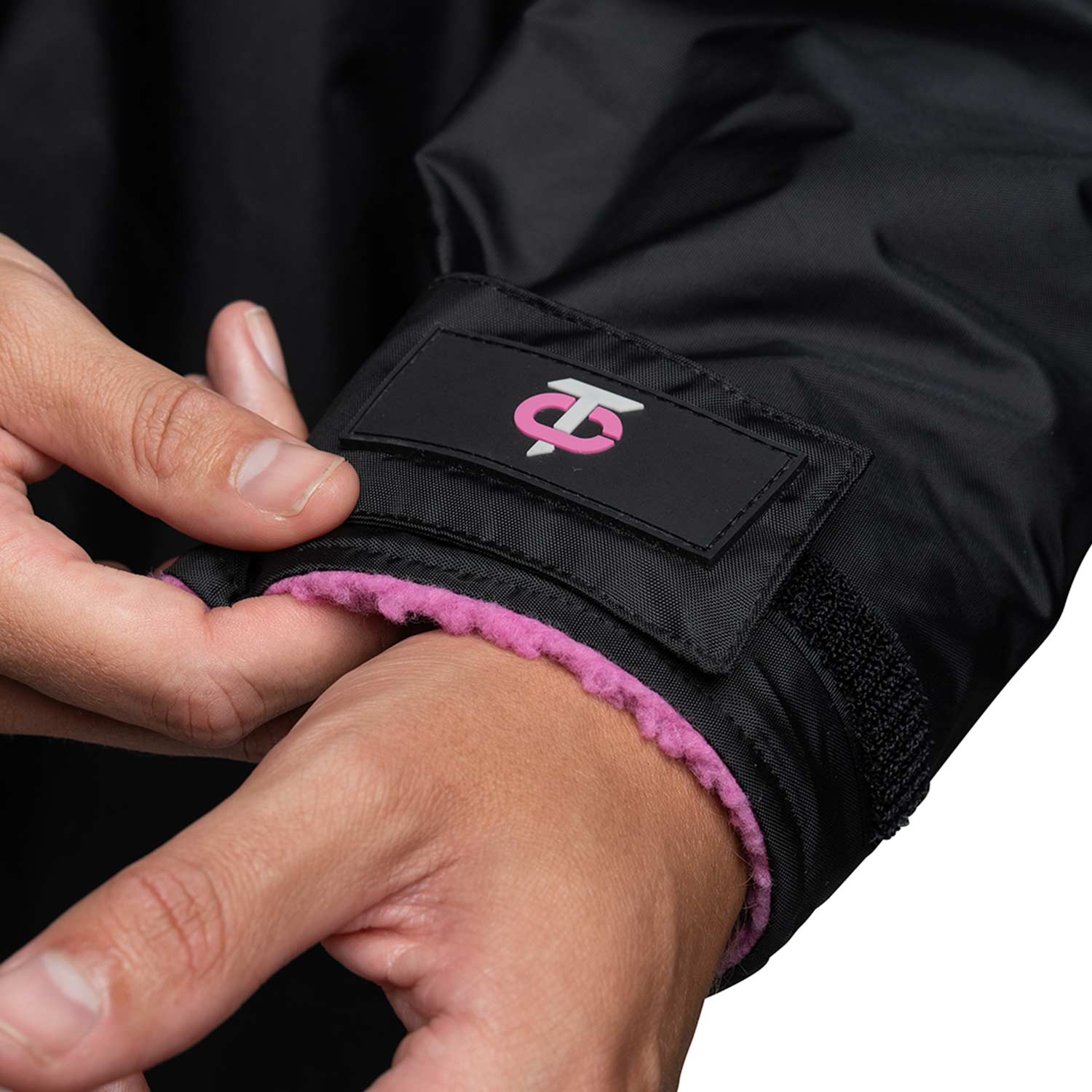 Close up image of the Black and pink T-Robe velcro cuffs