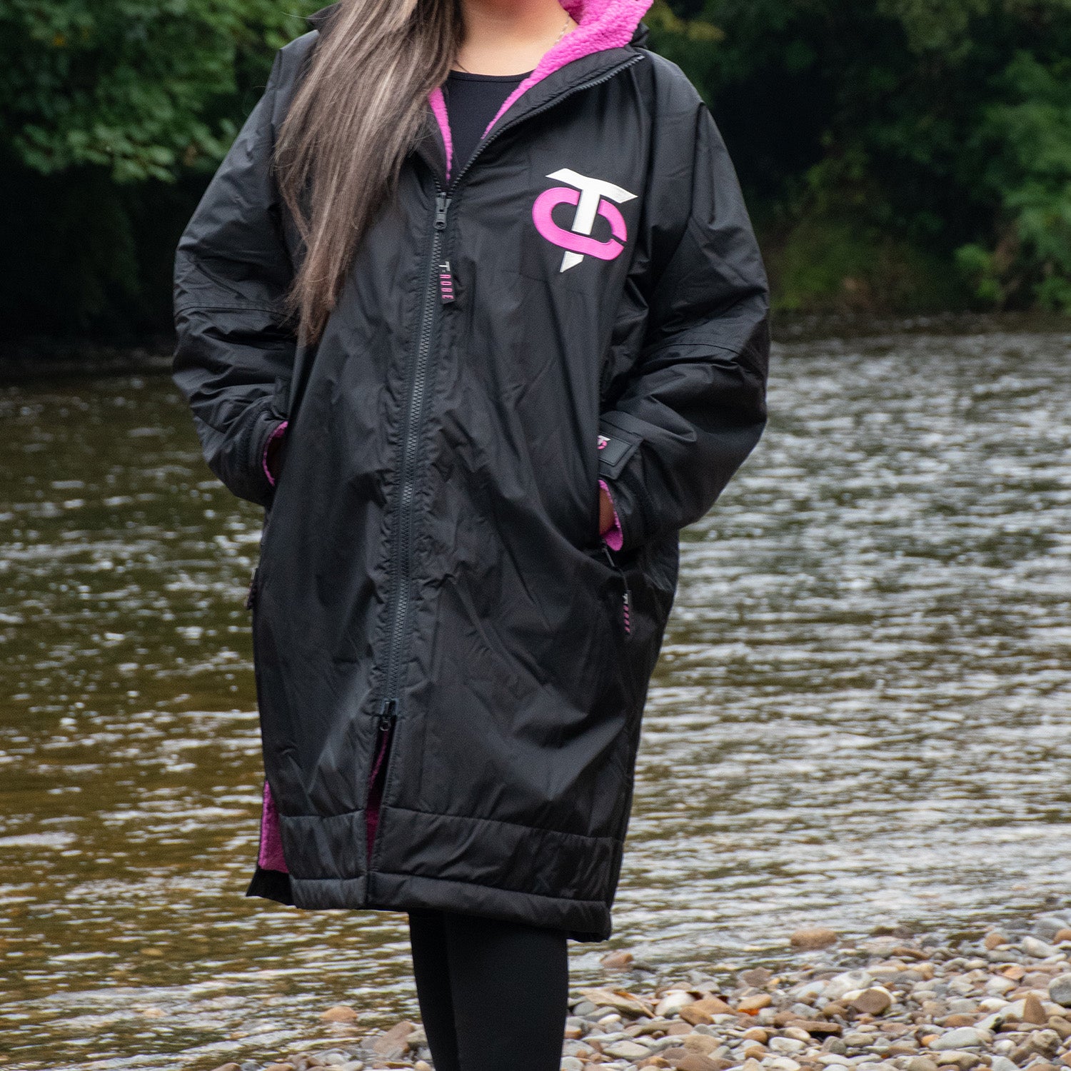 Front view of the black and pink T-Robe in an outdoor setting