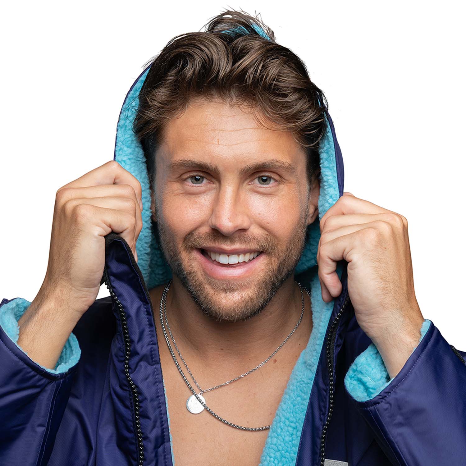 Image of a man wearing a T-Robe and pulling the hood up 