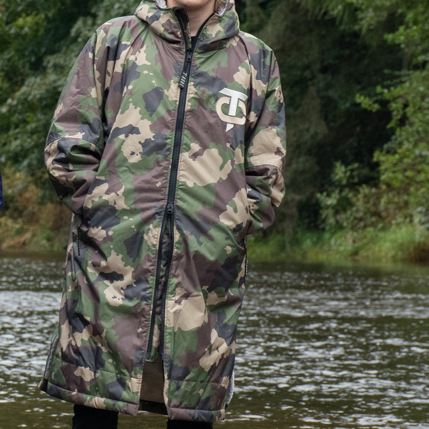 Front view of the Camo T-Robe in an outdoor setting