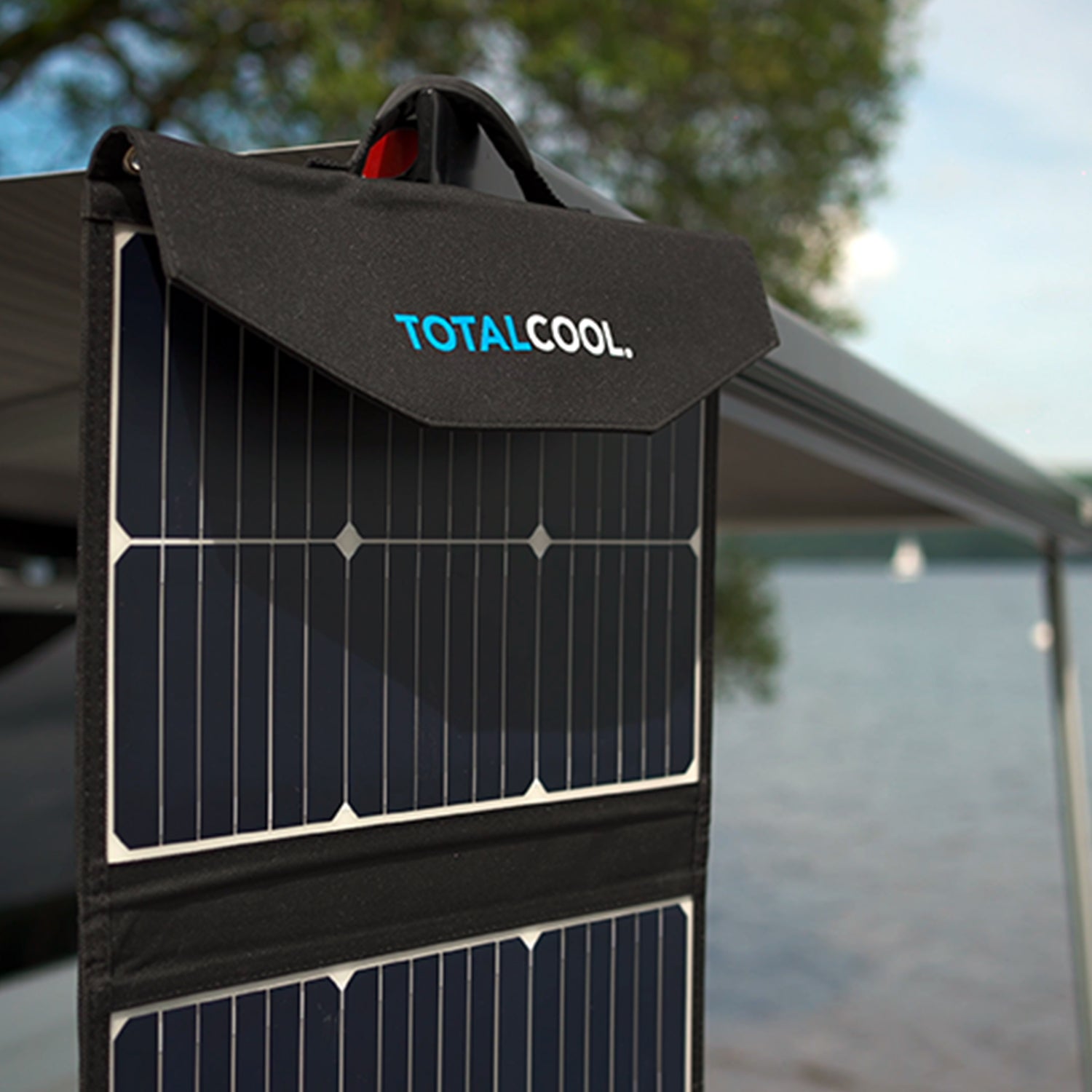 Lifestyle image of the TS100 solar panel being hung off the side of an outdoor awning